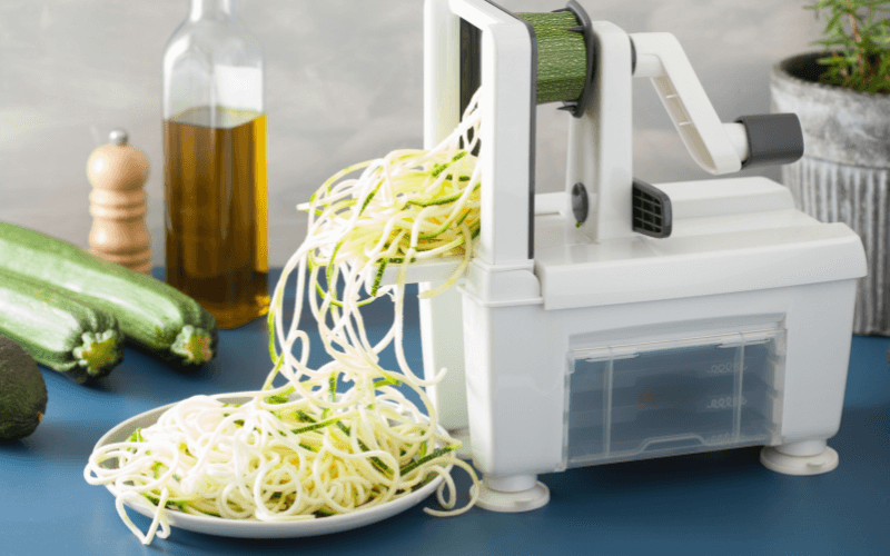 Image of a vegetable spiralizer being used in the kitchen