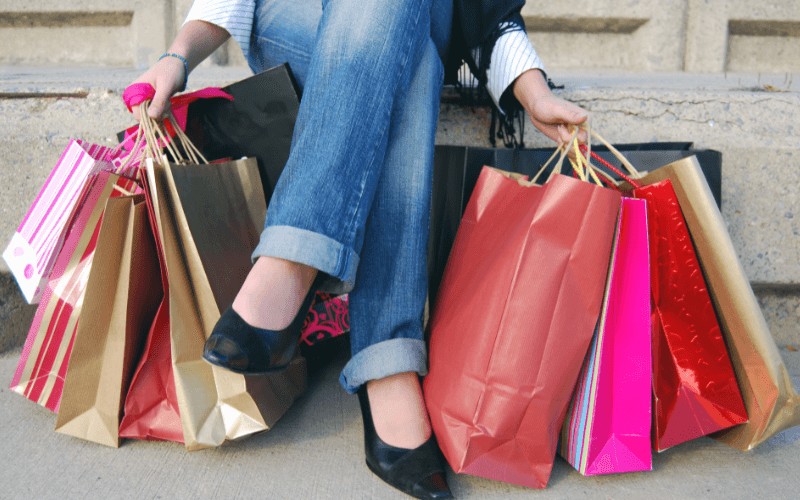 7 Biggest Shopping Centres in Singapore: Where to Shop ‘Til You Drop Image of a person with shopping bags.