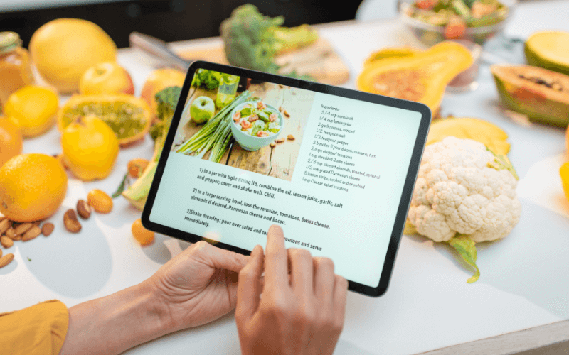 Your Little Sous Chef—8 Reasons Why You Should Use A Cooking App Image of a phone with a cooking app.