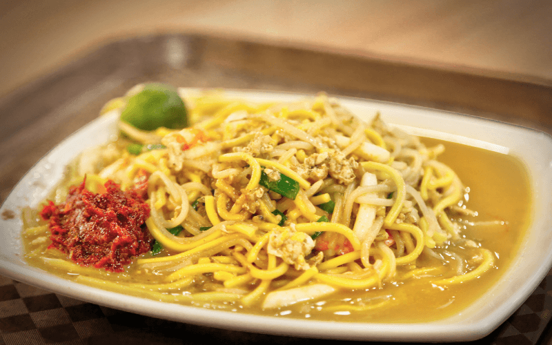 Global Flavors In A Bowl: 6 Noodle Spots To Visit In Singapore Image of a Singapore noodle dish