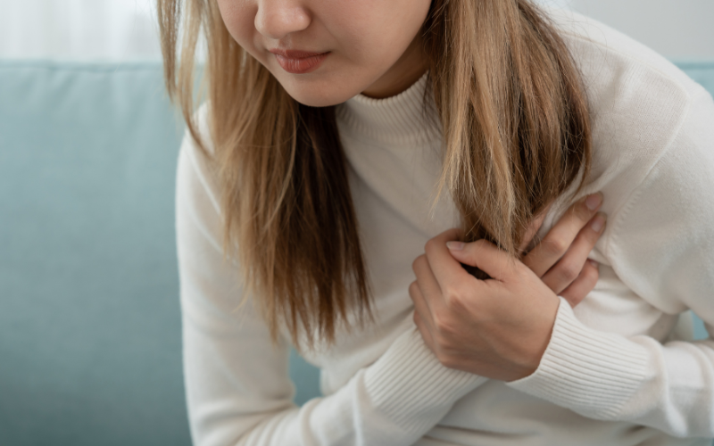A person experiencing chest pain