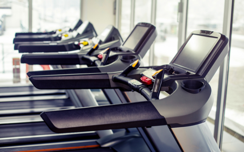 Pros And Cons Of Buying A Home Treadmill: Is It Worth It? An image of a person using a home treadmill