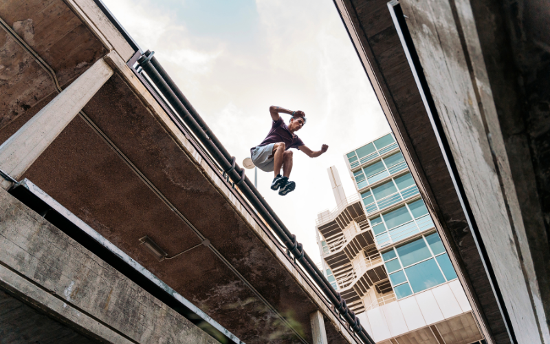 Person jumping from one building to another