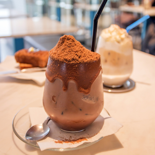 Small image of a bowl of ice cream with a scoop of protein powder