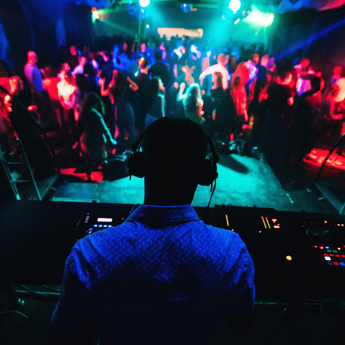 Small image of a dance club with a DJ
