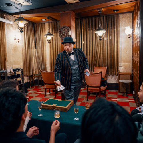 Small image of a magic show in a bar or club