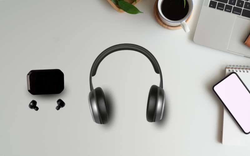 Headphones Vs Earbuds: Which Is Better For Your Workout? Image of a pair of headphones and earbuds placed on a table