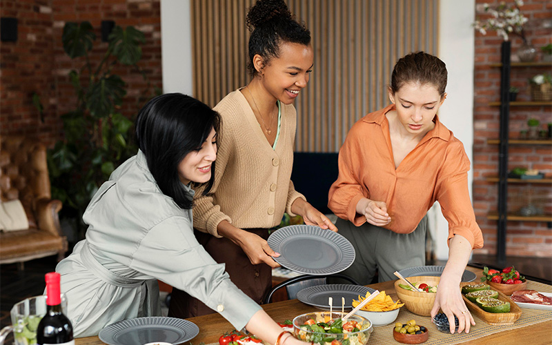 A group of people sharing a meal at a buffet.