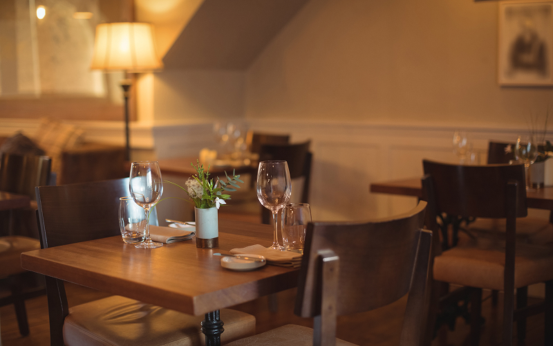 A stock photo of an ambient dining room.