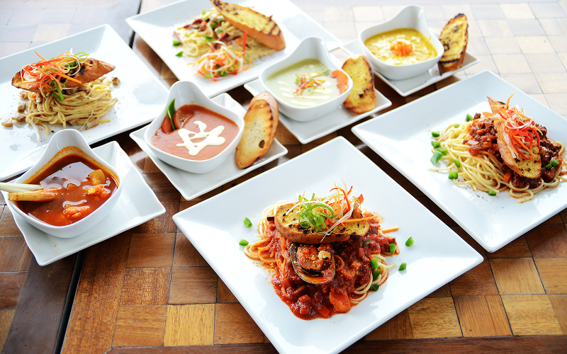 A row of tasting menu dishes