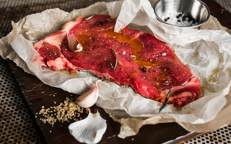 Image of a steak in a marinade