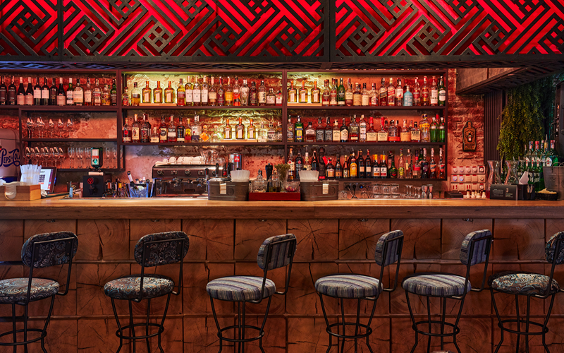 Discover Hidden Bars Near Orchard Road in Singapore An interior of a bar