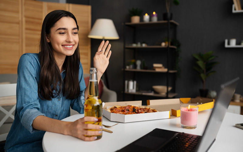 A person eating takeout at home