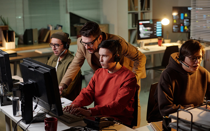 A group of programmers in an office space
