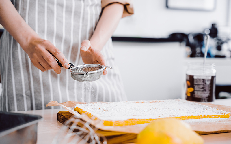 Image of a person baking in their kitchen