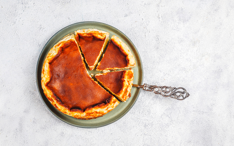 Why Burnt Cheesecake in Singapore Deserves a Spot on Your Dessert List Image of a whole burnt cheesecake