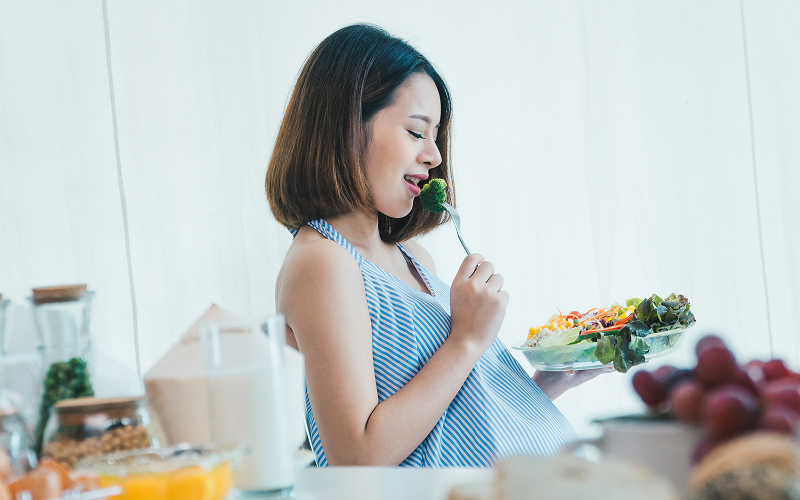 a person who is upbeat and positive while eating in the morning