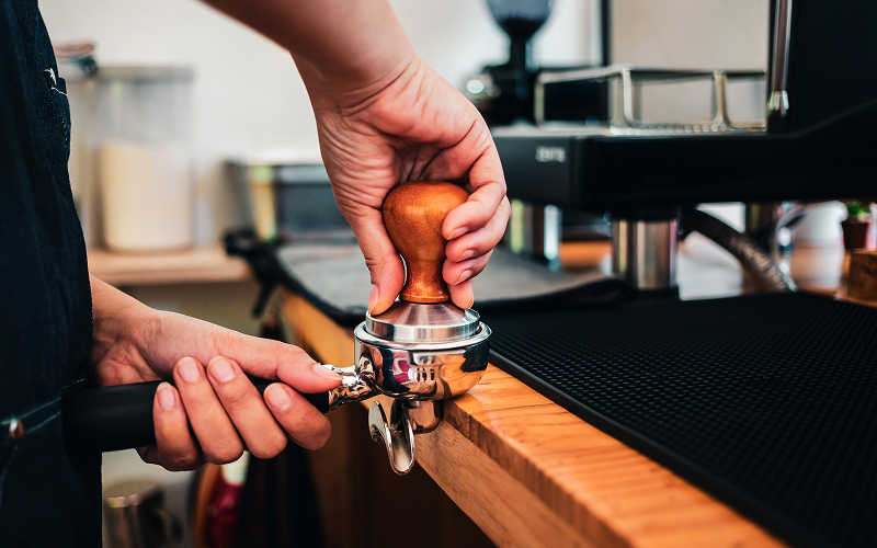 5 Essential Tech and Gadgets for Running the Best Cafes in Singapore Image of barista making coffee at a cafe