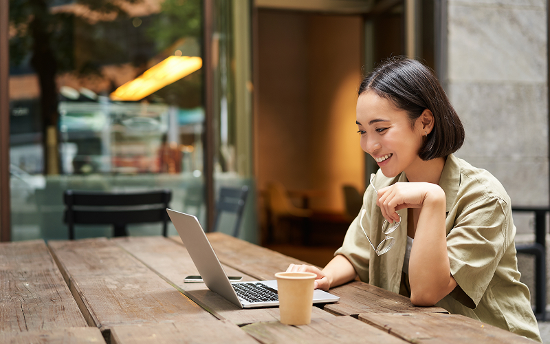 What to Order at Work-Friendly Cafes in Singapore: 6 Must-Try Menu Items Image of person on their laptop at a cafe